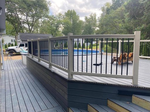 Composite Pool Deck with Cedar Railing and aluminum spindles 